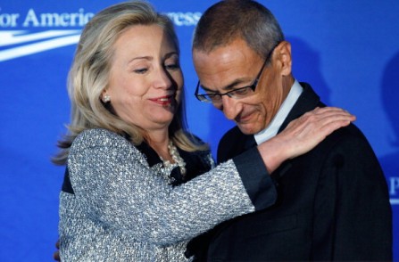 John Podesta Gets a Hug from Hillary at a 2011 CAP forum in Washington, DC